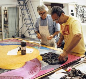 Frank Stella working on a print in his studio